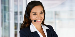Smiling young woman wearing a headset